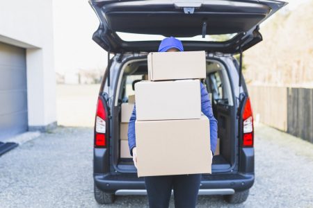 anonymous-courier-with-plenty-boxes (FILEminimizer)